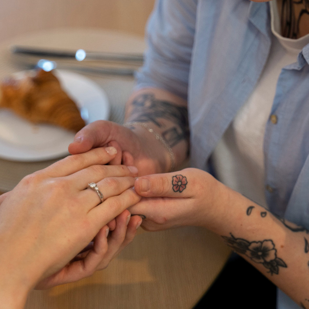 Hands exchanging a ring