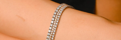 Diamond tennis bracelets on a wrist
